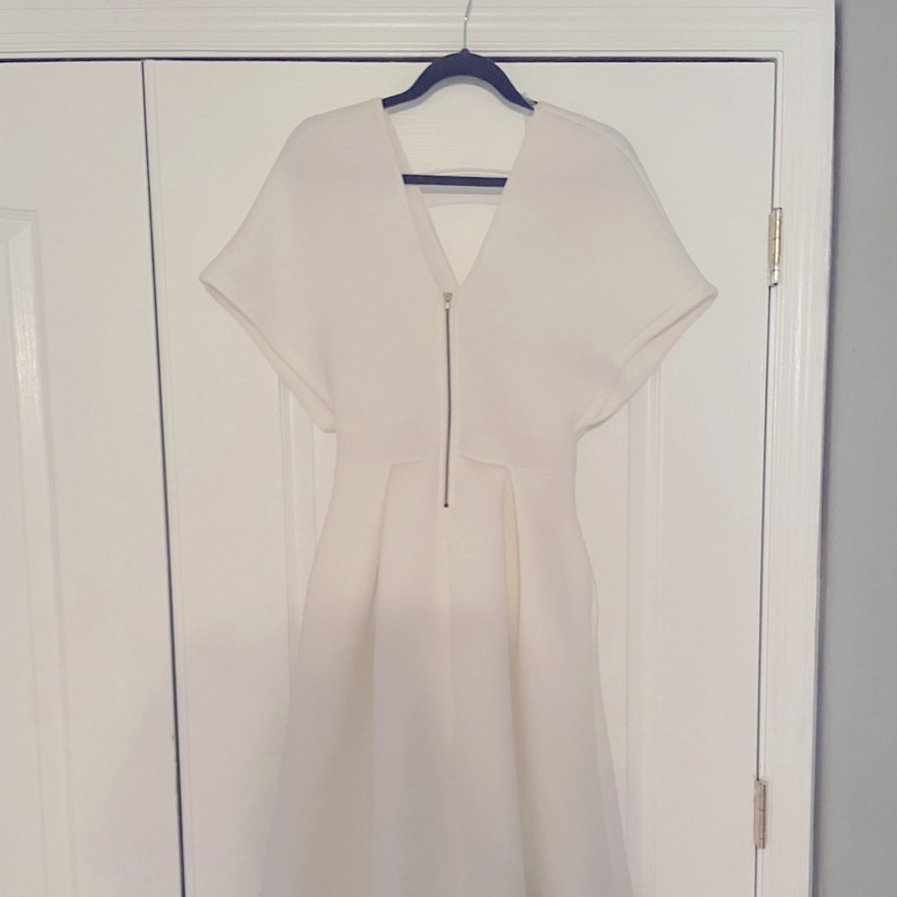 White dress with dolman sleeves